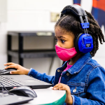  Image of student with chromebook